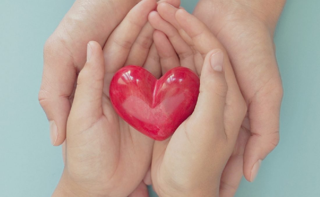 Hands reaching out in support